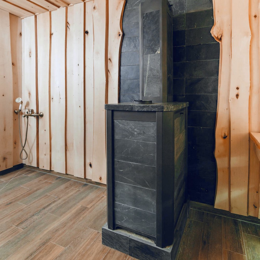 Печь для бани Варвара Сказка 24 "Дуэт" в облицовке Пироксенит без выносной топки дверка со стеклом, парная 12 – 24 м³