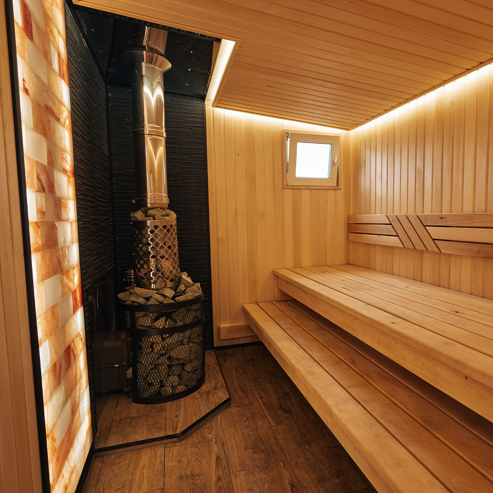 Печь Искандер ЗК 18 Pro Ураган  с доп. кольцом, с сеткой для камней и панорамной дверцей со стеклом для парных до 18 м³